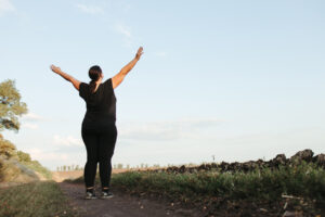 woman looking out over a hill